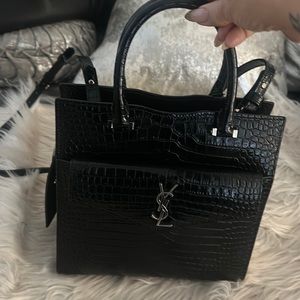 Black YSL with silver accessories size 9 x 9 excellent condition